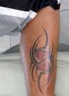 Tribal Love tattoo