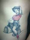 cowgirl pin-up tattoo