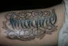 "imagine" tattoo