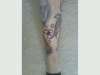 leg again tattoo