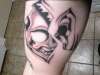 skull tear tattoo