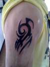 tribal arm piece tattoo