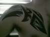 tribal with blue tattoo