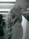 tribal with blue tattoo