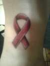 Cancer ribbon tattoo