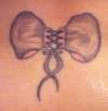 Grey and Pink Bow tattoo