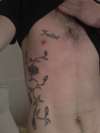 Roses and Freebird tattoo