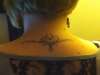 bk of neck tatt tattoo