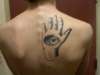 eye in hand tattoo