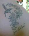 free as a bird. tattoo