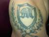 my family shield of arms tattoo