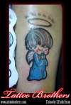 Paying Baby Angel tattoo