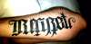 Regret / Nothing Ambigram tattoo