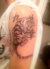 Tiger and symbols tattoo