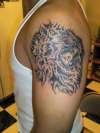 Tribal Lion tattoo