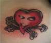 heart & crossbones tattoo