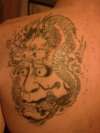 left back tattoo
