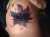 Flower cover up tattoo