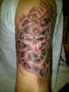 Mangled skull tattoo