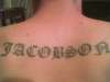 Last Name Lettering tattoo