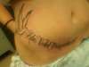 "she flies with her own wings" tattoo
