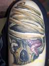 skull zombie type thing tattoo