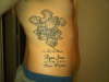 tated rib tattoo