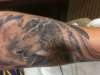 wolf on left forearm tattoo