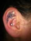 Ear Tattoo. tattoo