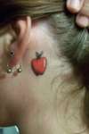 There's an apple behind my ear tattoo