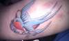 blue swallow tattoo