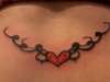 heart trampstamp tattoo