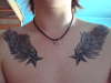stars and angel wings tattoo