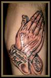 Praying hands tribute tattoo