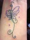 butterfly in tribute tattoo