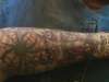 Skulls Behing cross With Spider Web tattoo