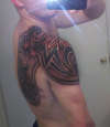 Tribal armor back tattoo