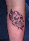 Tribal skull tattoo