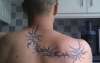 Upper back Tribal tattoo