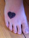 Zebra heart tattoo