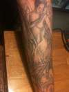 cross with dermal 2 tattoo
