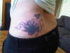 egyptian lotus flower and celtic design tattoo
