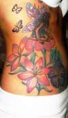 fairies and flowers tattoo