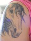 horse coverup tattoo