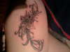 shqded flower tattoo