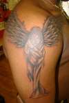 GUARDIAN ANGEL on black skin tattoo