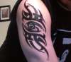 Tribal Cancer tattoo