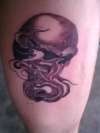 alien skull tattoo