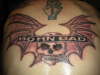 bat wing skull tattoo
