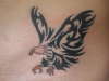 eagle in tribal style tattoo